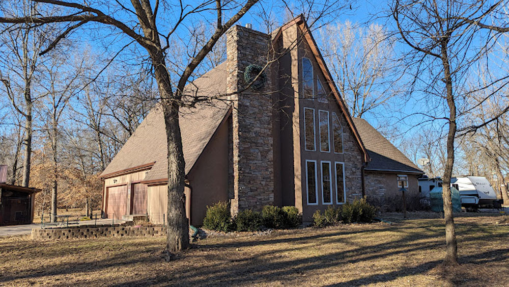 A-frame house with a newly installed residential roof